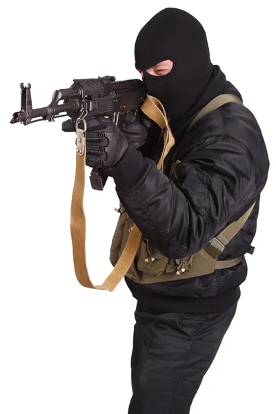 Terrorist met kalashnikov — Stockfoto