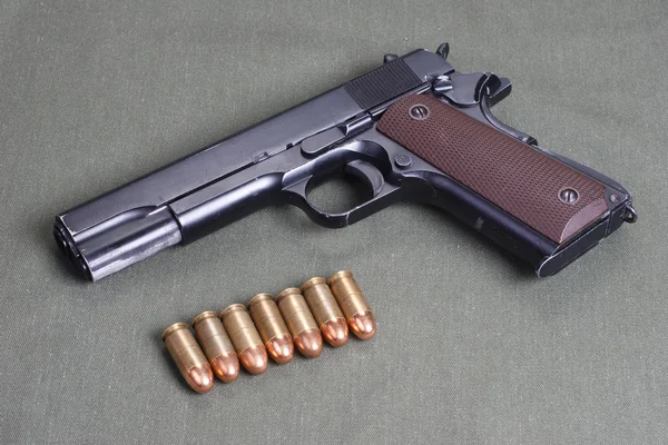 Tło z colt m1911 — Zdjęcie stockowe