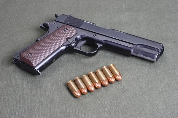 Tło z colt m1911 — Zdjęcie stockowe