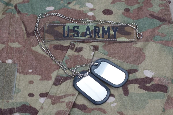 Us army camouflaged uniform with blank dog tags — Stock Photo, Image