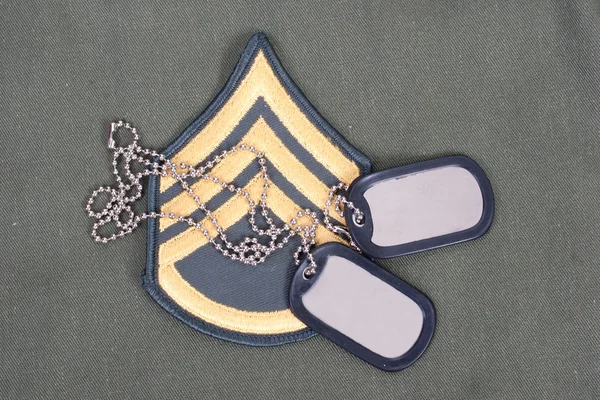 Us army uniform with blank dog tags and sergeant rank patch — Stock Photo, Image