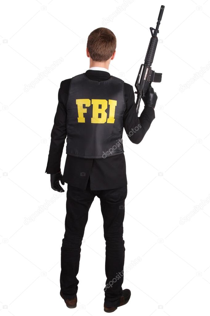 FBI Agent with rifle - Stock Photo, Image. 
