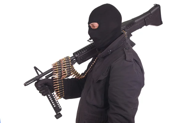 Rebel in black uniforms with machine gun — Stock Photo, Image