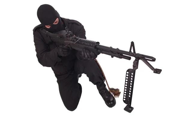 Man in uniforms with machine gun — Stock Photo, Image