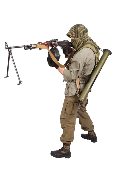 Повстанцы носят кеффию с пулеметом — стоковое фото