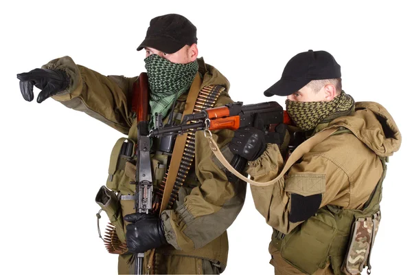 Повстанцы с АК 47 и пулеметом — стоковое фото
