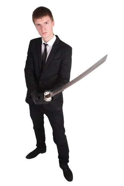 Man in black suit and katana sword — Stock Photo, Image