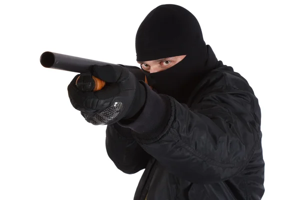 Ladrão em máscara preta com espingarda — Fotografia de Stock