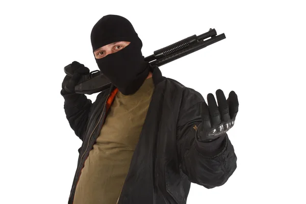 Rånare i svart mask med hagelgevär — Stockfoto