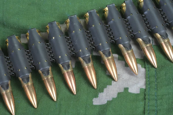 Ammunition belt on camouflage uniform — Stock Photo, Image