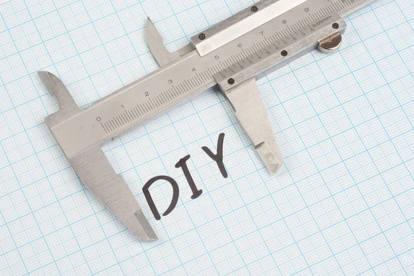 "Do it yourself" on  graph paper background — Stock Photo, Image