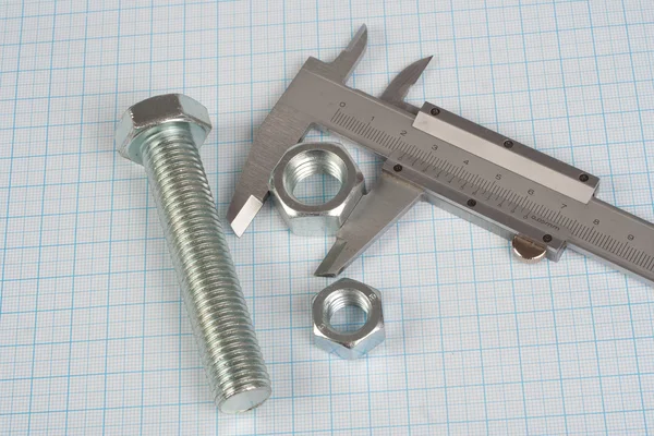 Screw, Nuts and caliper — Stock Photo, Image