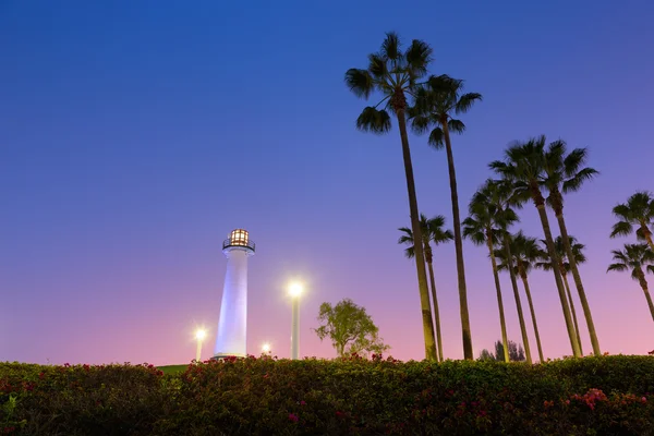 Longo farol do porto de praia — Fotografia de Stock