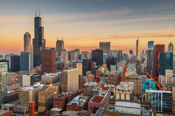 Chicago, Illinois, USA aerial cityscape with high rises in the early morning.