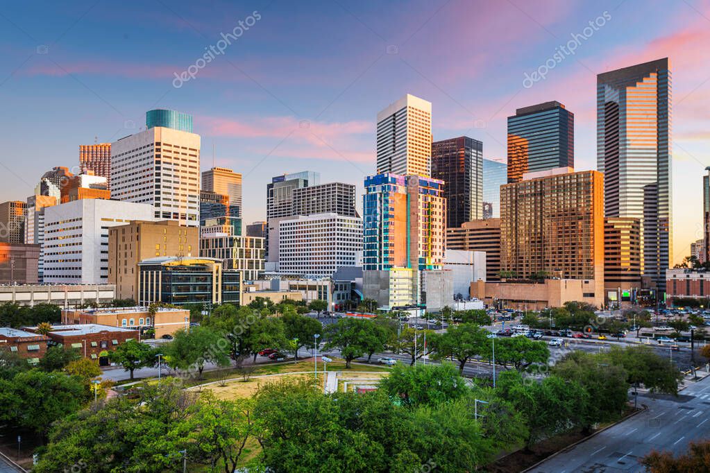 Houston, Texas, USA downtown park and skyline at twilight.