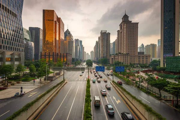 Shenzhen, China downtown cityscape and urban roads.