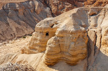 Cave of the Dead Sea Scrolls, known as Qumran cave 4, one of the caves in which the scrolls were found at the ruins of Khirbet Qumran in the desert of Israel. clipart