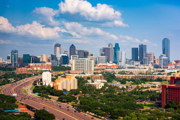 Dallas, Texas, USA downtown city skyline from above over highways.