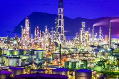 Oil Refineries at night clipart