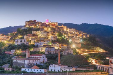 Corigliano Calabro, Italy hilltop townscape at twilight.