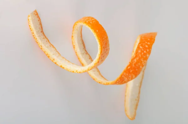 Orange Skin Spiral Gray Background Top View Close — Stock Photo, Image