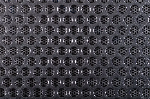 texture background holes on black metal with mesh