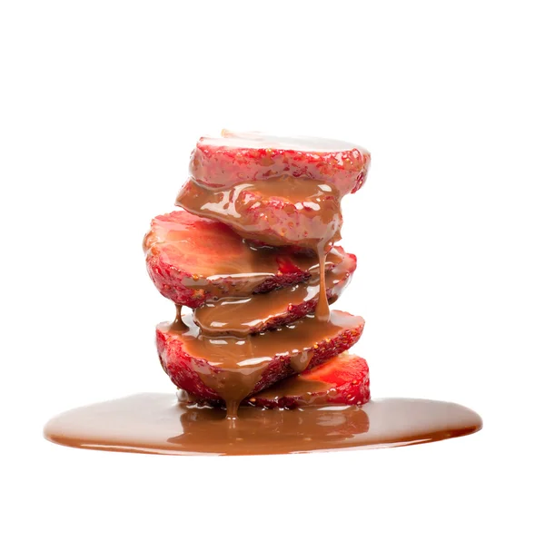 Melted chocolate on strawberry slices — Stock Photo, Image