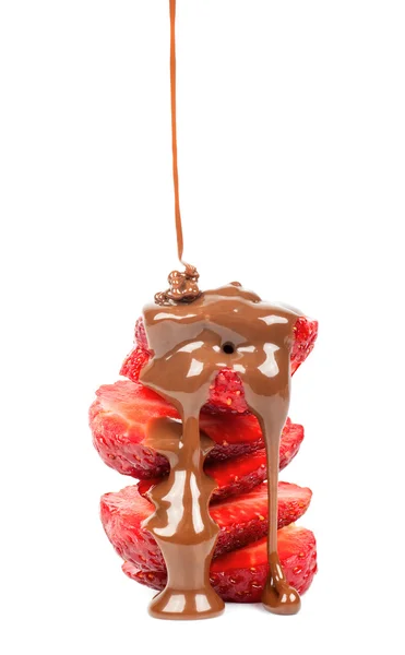 Pouring chocolate on strawberry slices — Stock Photo, Image