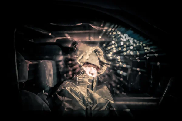 Man in car at night — Stock Photo, Image