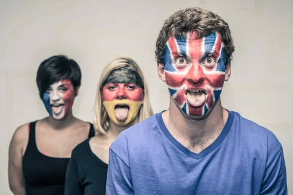 Funny people with European flags on faces — Stock Photo, Image