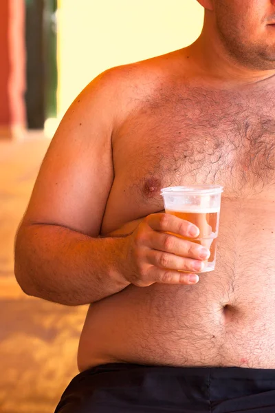 Obese man with beer — Stock Photo, Image