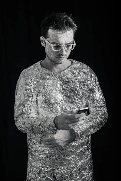 Spaceman con teléfono móvil — Foto de Stock
