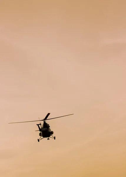 The patrol helicopter flying in the sky — Stock Photo, Image