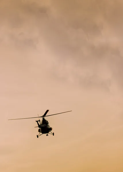 The patrol helicopter flying in the sky — Stock Photo, Image