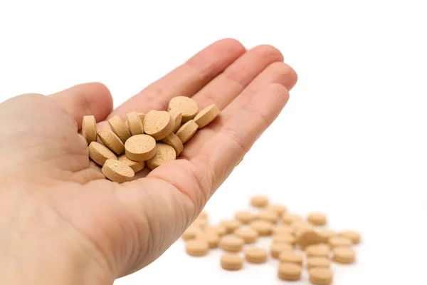 Holding pills — Stock Photo, Image