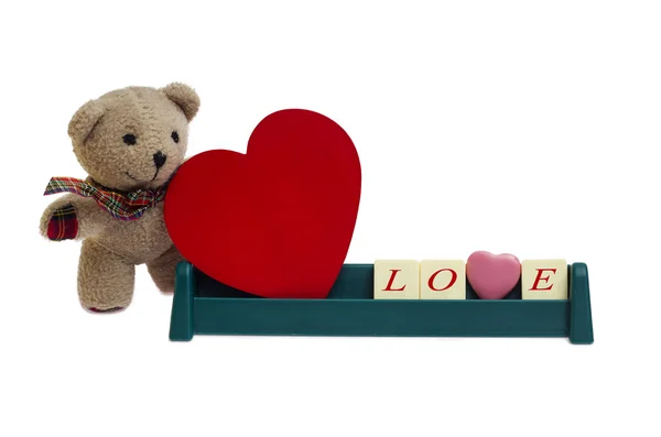 Decorative letters forming word LOVE with teddy bear — Stock Photo, Image