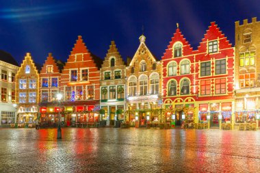 Christmas Old Market square in the center of Bruges, Belgium clipart