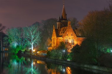 Fairytale night landscape at Lake Minnewater in Bruges, Belgium clipart