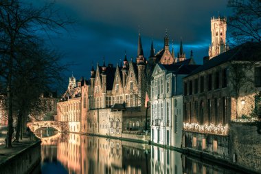 Night tower Belfort and the Green canal in Bruges clipart