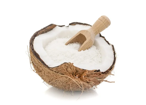 Getrocknete Kokosnuss und Holzlöffel — Stockfoto