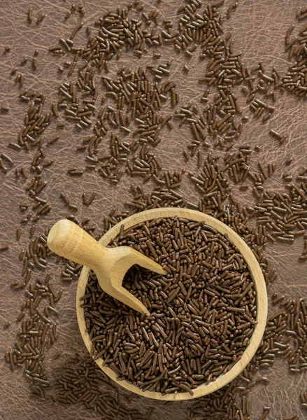 A bowl of chocolate sprinkles — Stock Photo, Image