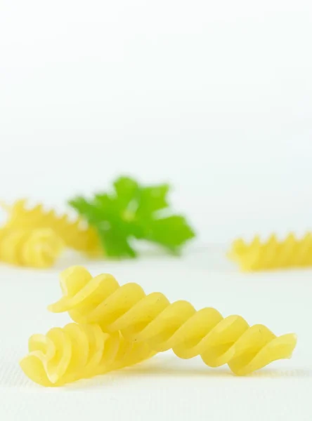 Spiral shaped pasta pieces — Stock Photo, Image