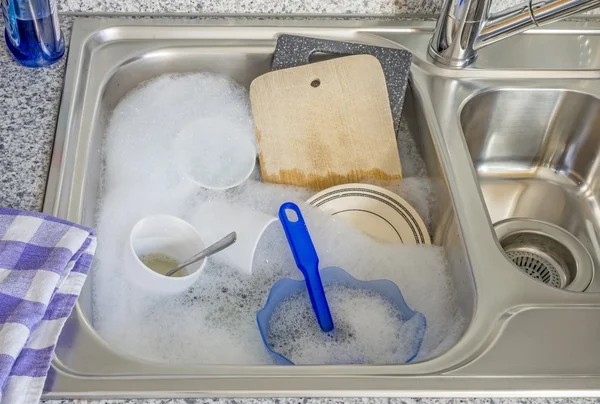 Dirty Dishes in a Kitchen Sink — Stock Photo, Image