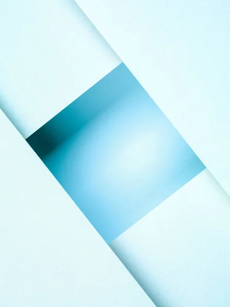 正方形を形成する紙シートと照明の色合いで作られた抽象的な紙の背景 — ストック写真