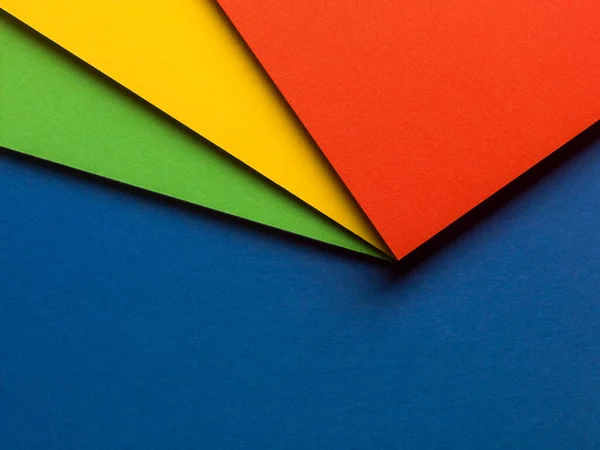 Buntes Papierdesign Mit Rotem Gelbem Und Grünem Hintergrund Auf Blauem — Stockfoto