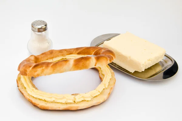 Bagel with butter and salt — Stock Photo, Image