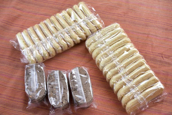 Individual packages of light snacks and cookies — Stock Photo, Image