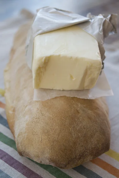 Pat van boter op een brood van brood — Stockfoto