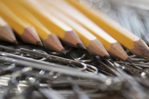 Colored pencils and clips — Stock Photo, Image