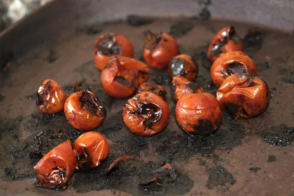 Tomatoes roasted on the griddle — Stock Photo, Image